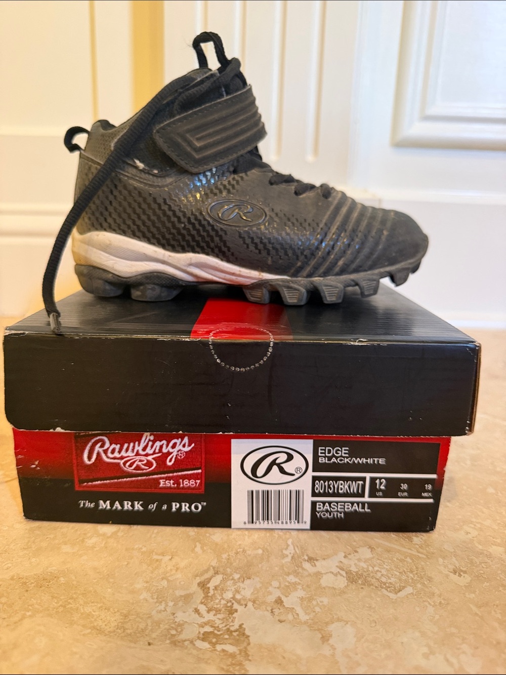 Rawlings Black Youth Baseball Cleat with White Accents